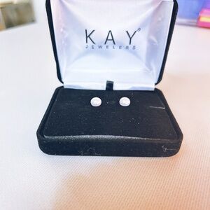 Kay Jewelers pearl stud earrings in a black box.